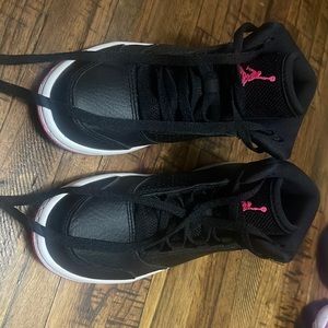 Black and pink Nike Jordan’s kids
